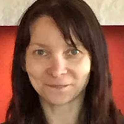 Headshot of Olga Scrivner